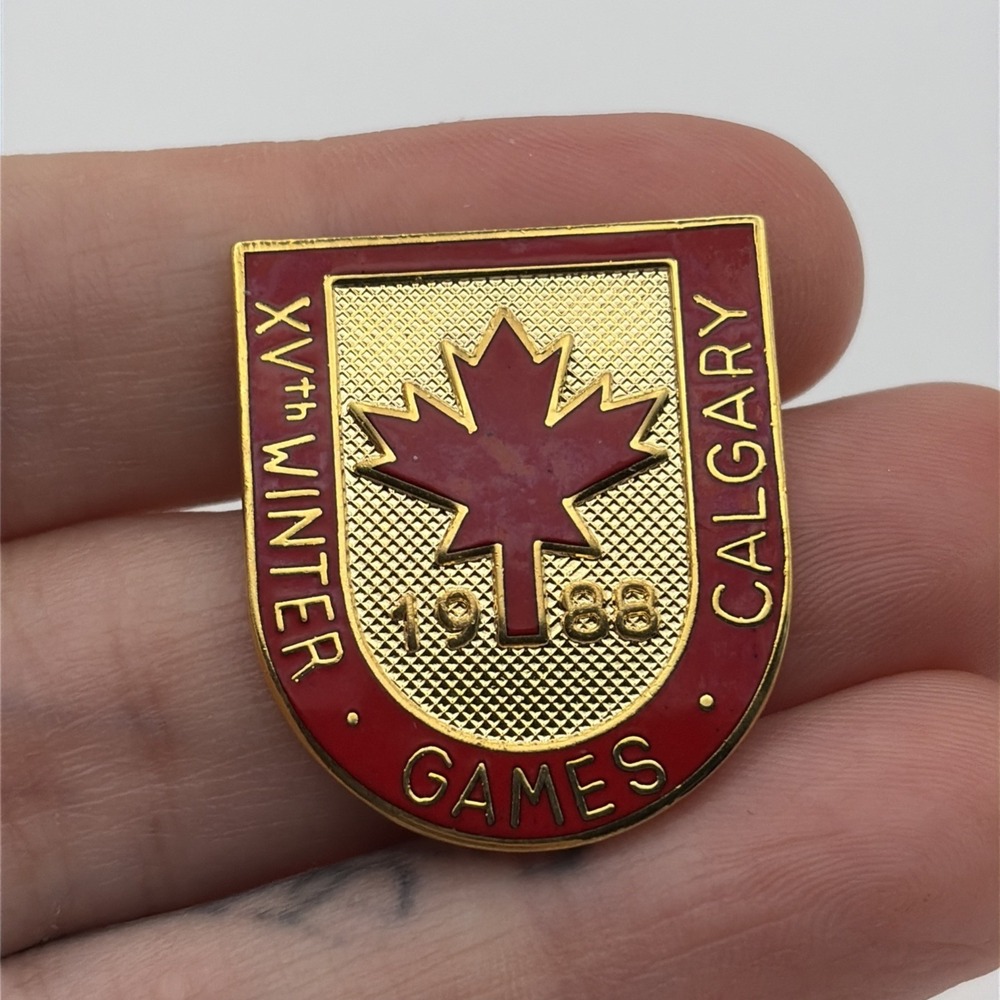 Vintage 1988 Calgary XV Winter Olympic Games Pin Maple Leaf Shield Gold Tone